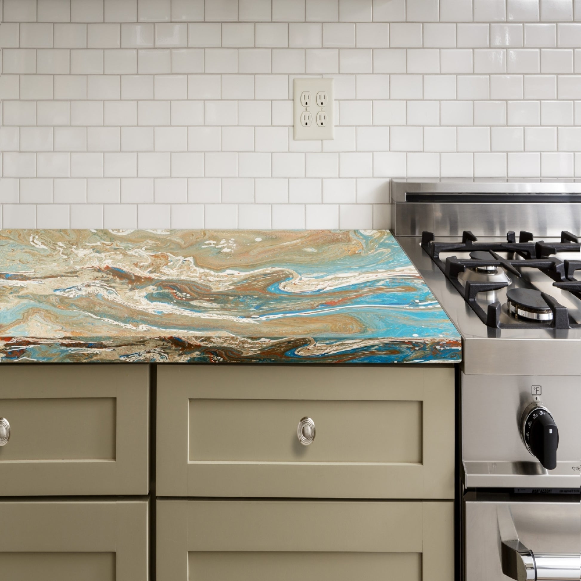 Revamp your kitchen with an epoxy resin countertop that resembles natural stone.