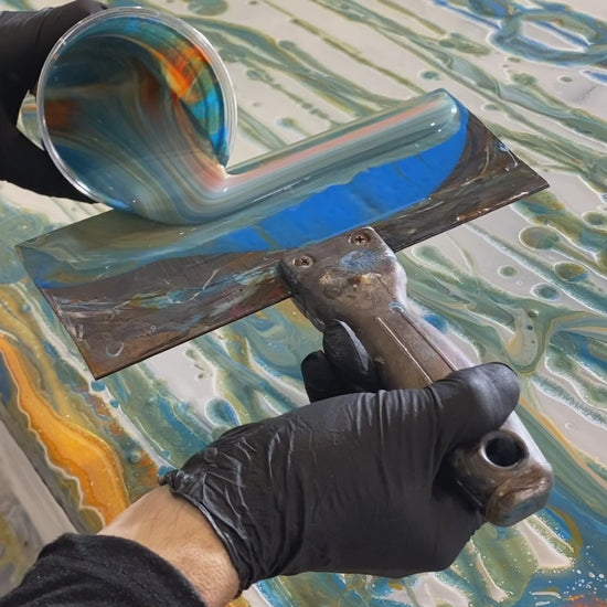 Stunning and sophisticated epoxy resin surface with a vibrant blend of colors.