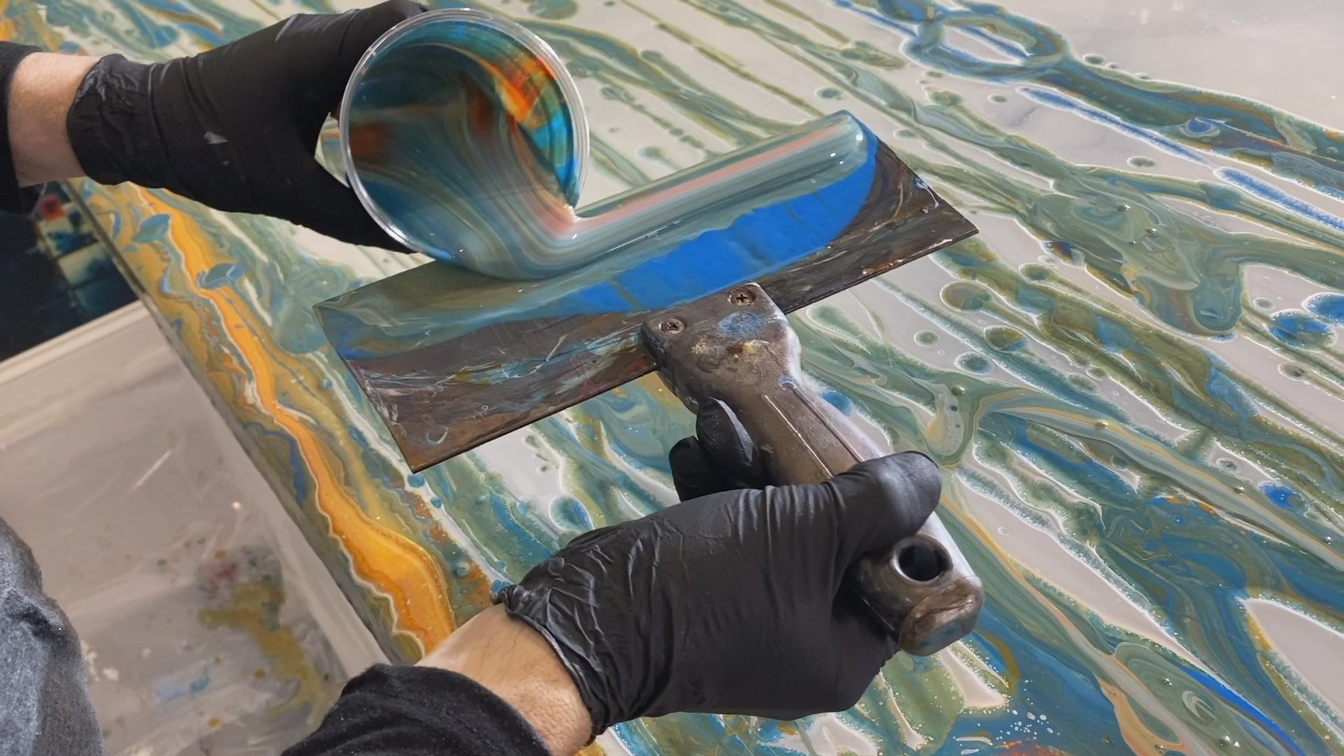 Stunning and sophisticated epoxy resin surface with a vibrant blend of colors.